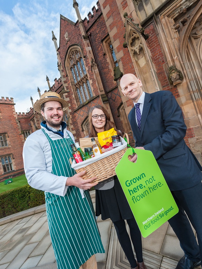 Sarah Campbell from FoodNI, Charlie Cole from Broughgammon Farm and Chris Elliott, Director of Queens Universitys Institute for Global Food Security, show off some of the home-grown products that will be offer at the FoodNI Artisan Market at Queens. 