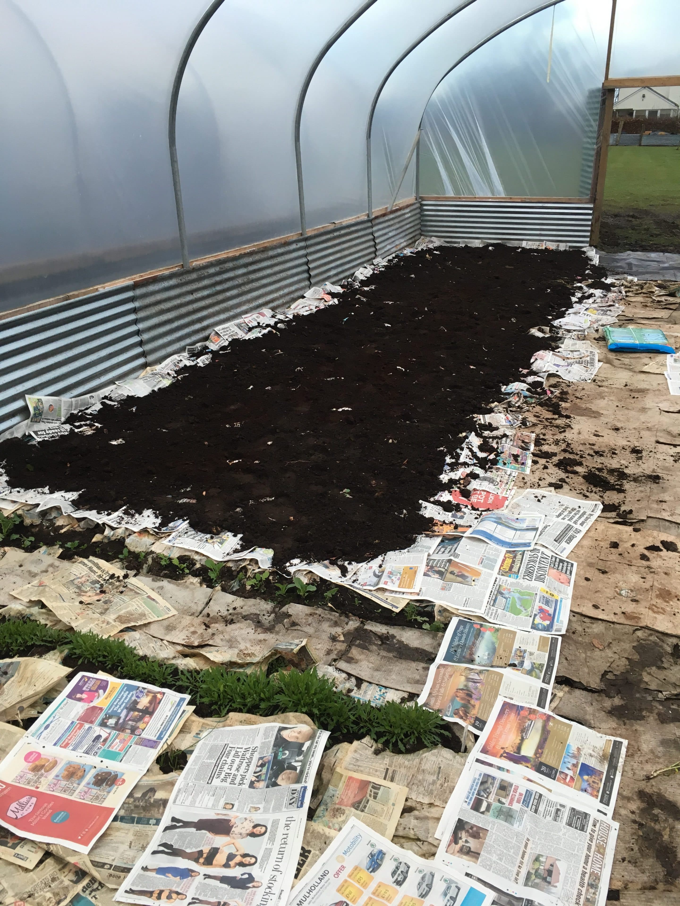 No-Dig beds being mulched in compost